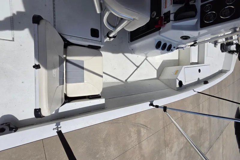 Slide: The Image of 2022 G3 Bay 18 GX boat interior with seating and control panel. - 6