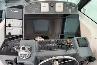Slide: The Image of Control panel of a 2002 Pursuit 3800 Express boat with navigation equipment. - 7