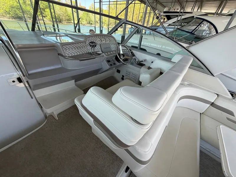 Slide: The Image of Interior of a 1999 Formula 41 Performance Cruiser with white seating. - 10