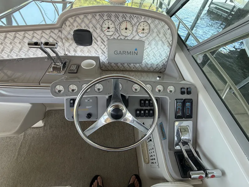 Slide: The Image of 1999 Formula 41 Performance Cruiser helm with Garmin system. - 12