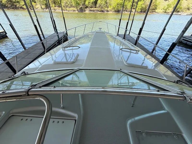 Slide: The Image of 1999 Formula 41 Performance Cruiser at dock, front deck view. - 13