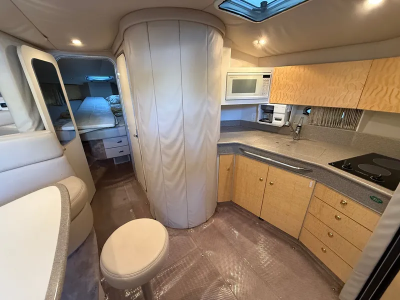 Slide: The Image of Interior of a 1999 Formula 41 Performance Cruiser yacht. - 16