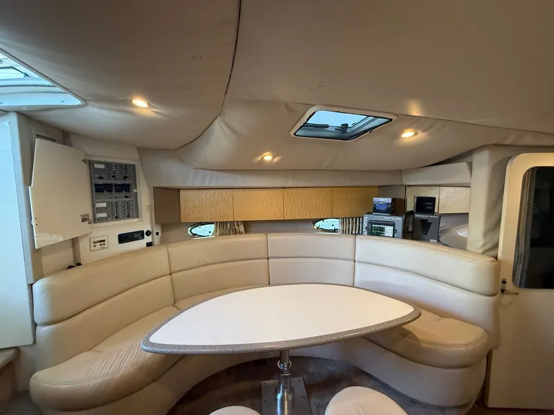 Slide: The Image of Interior of a 1999 Formula 41 Performance Cruiser with leather seating area. - 18