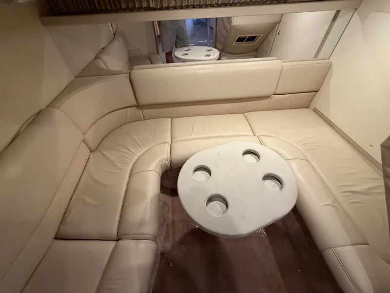 Slide: The Image of Interior of 1999 Formula 41 Performance Cruiser with beige leather sofa. - 19