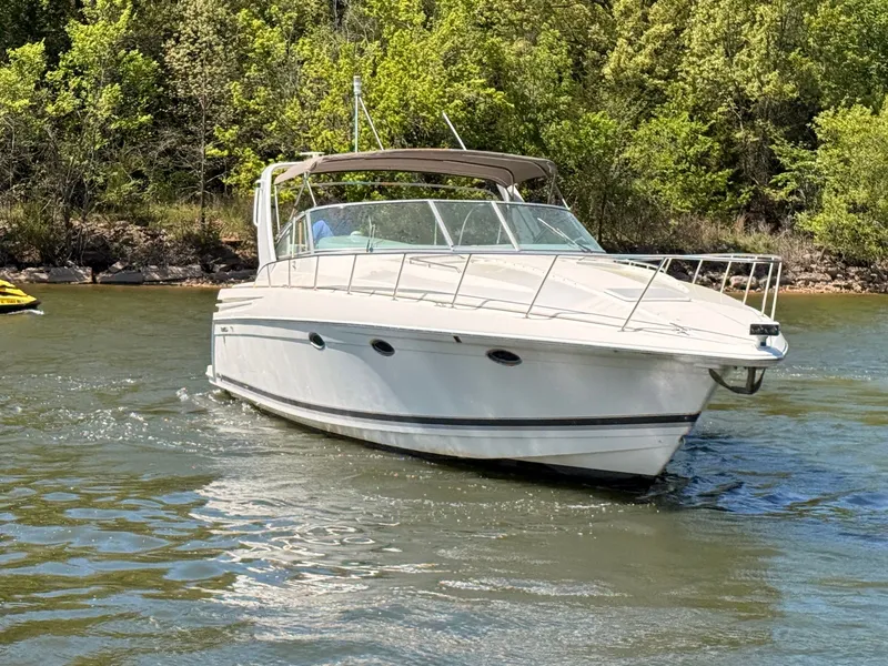 Slide: The Image of 1999 Formula 41 Performance Cruiser on a river. - 3