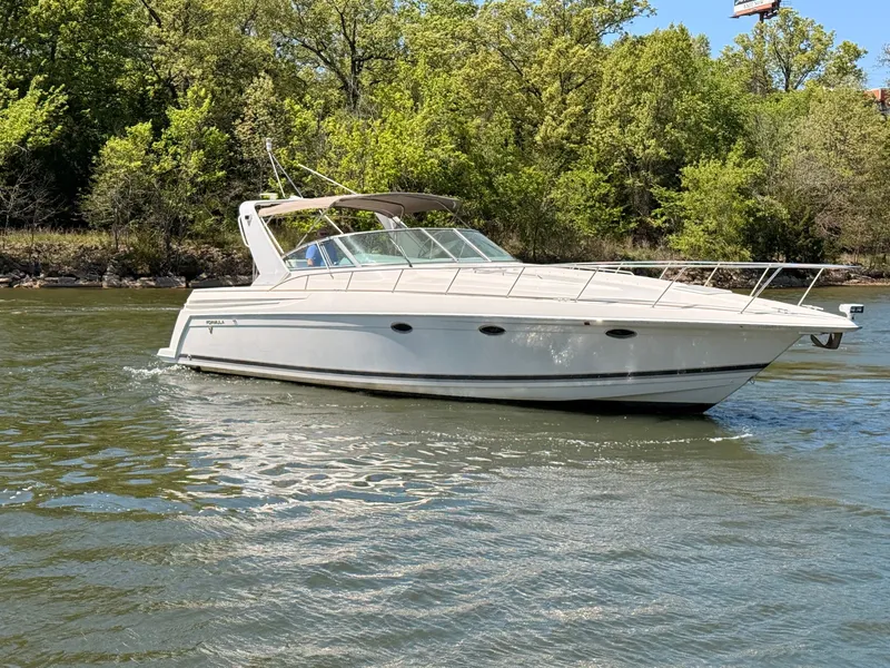 Slide: The Image of 1999 Formula 41 Performance Cruiser on a river. - 4