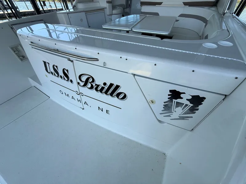 Slide: The Image of 1999 Formula 41 Performance Cruiser with "U.S.S. Brillo" lettering. - 7