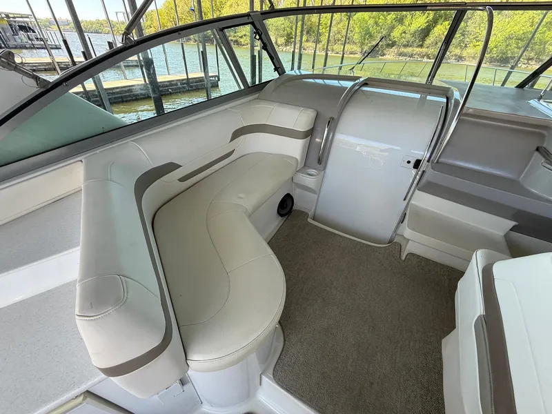 Slide: The Image of Interior of a 1999 Formula 41 Performance Cruiser with seating area. - 9