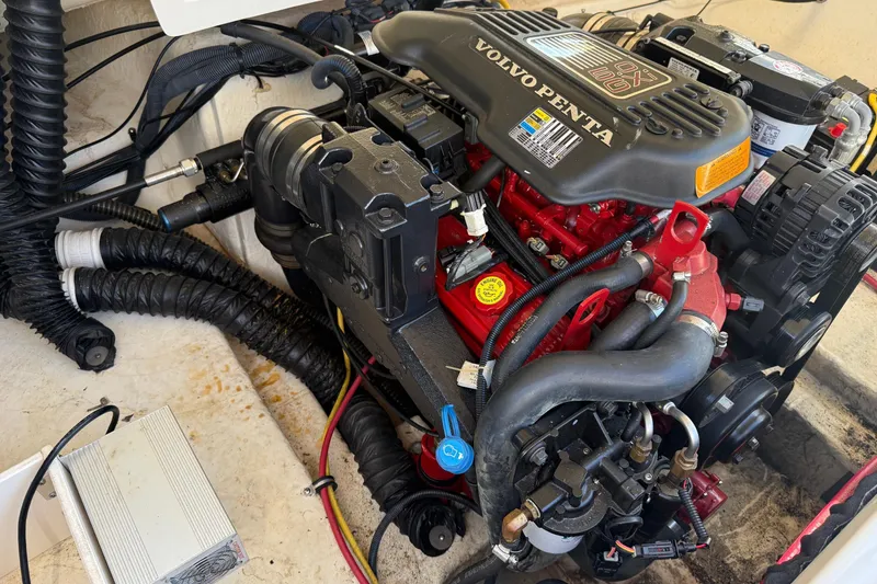 Slide: The Image of Volvo Penta engine in a 2005 Chaparral 236 SSi boat, showcasing detailed components. - 19