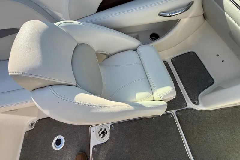 Slide: The Image of White leather seat in 2005 Chaparral 236 SSi boat interior. - 29
