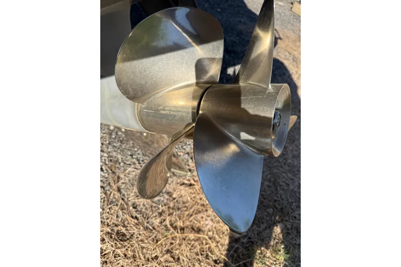 Slide: The Image of Close-up of a brass boat propeller on a 2005 Chaparral 236 SSi. - 39