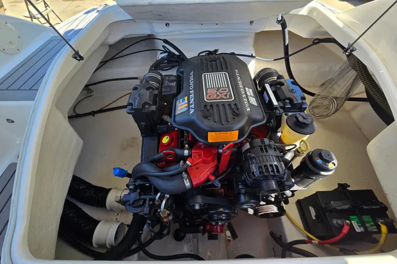 Slide: The Image of 2010 Chaparral Sunesta 224 boat engine compartment with Volvo Penta 5.0 GXI engine. - 39
