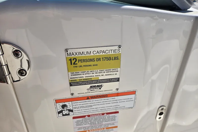 Slide: The Image of 2010 Chaparral Sunesta 224 capacity label, maximum 12 persons or 1750 lbs. - 47