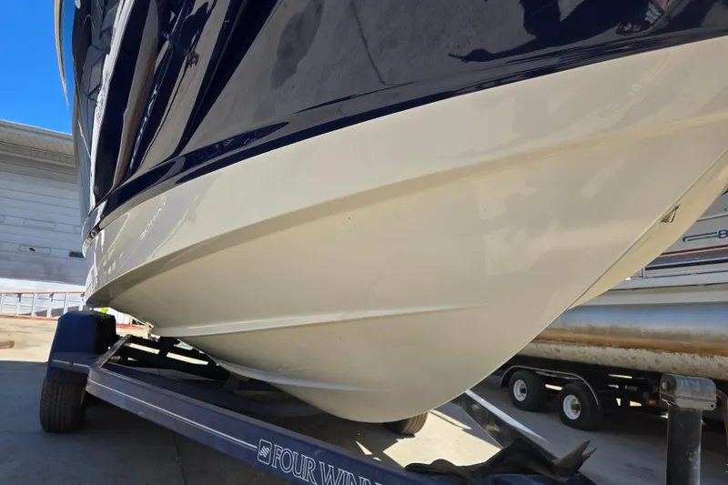 Slide: The Image of 2010 Chaparral Sunesta 224 boat on trailer, close-up of hull design. - 7