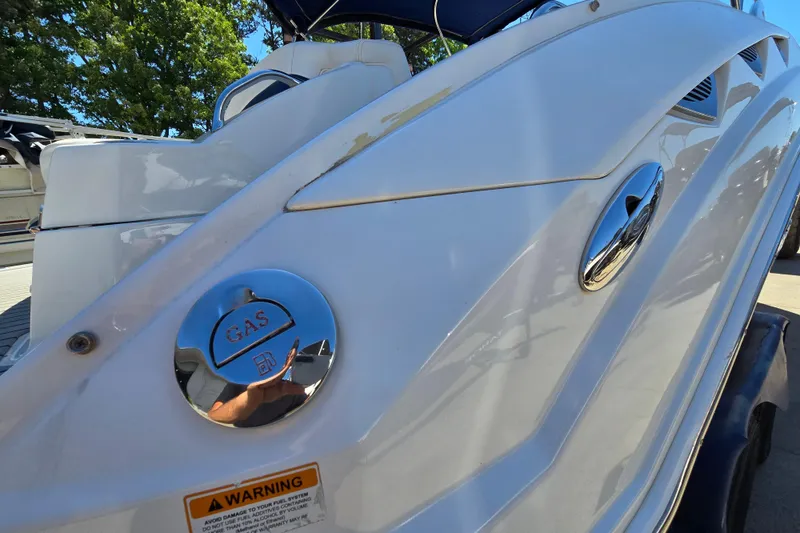 Slide: The Image of 2010 Chaparral Sunesta 224 boat with gas cap and warning label. - 8