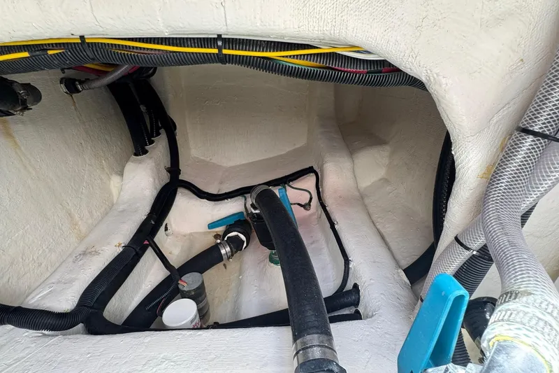 Slide: The Image of Interior view of 2024 Invincible 35 Catamaran's hull with wiring and plumbing. - 18