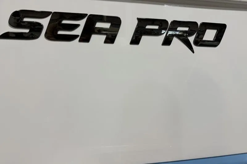 Slide: The Image of 2026 Sea Pro 222 Center Console boat logo on white surface. - 7