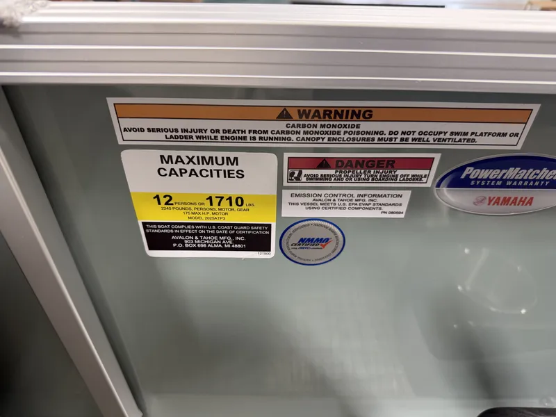 Slide: The Image of Warning labels and capacity details on Avalon VNT VRB21T boat. - 18