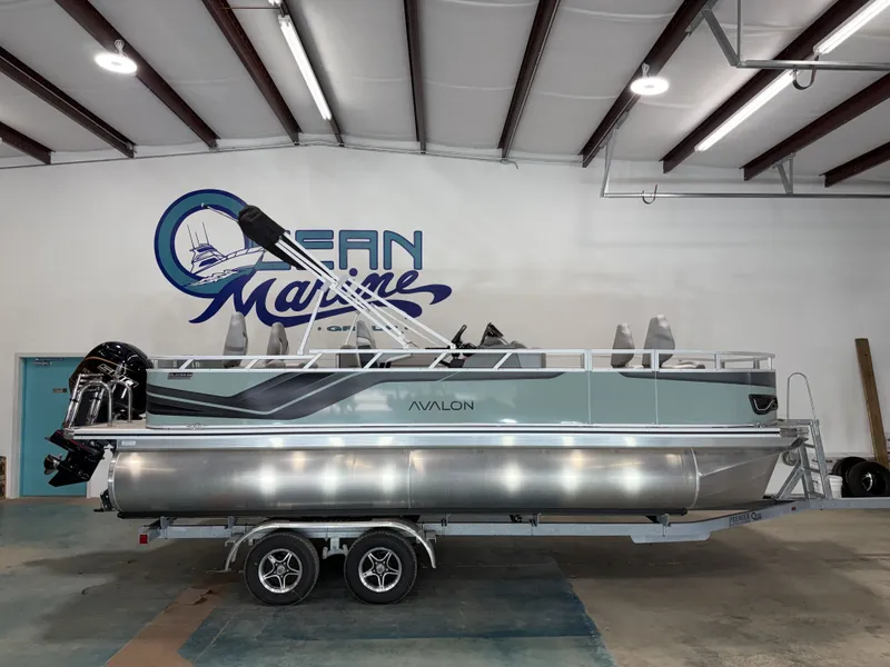 The Image of 2026 Avalon Venture 85 Rear Fish boat in a showroom. - 1