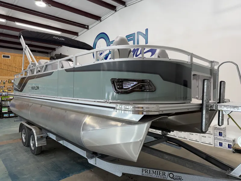 Slide: The Image of 2026 Avalon Venture 85 pontoon boat in showroom. - 16