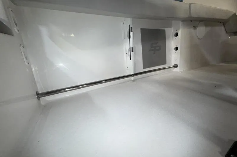 Slide: The Image of Interior view of 2026 Sea Pro 225 FLXR Sandbar boat, featuring sleek white design. - 14