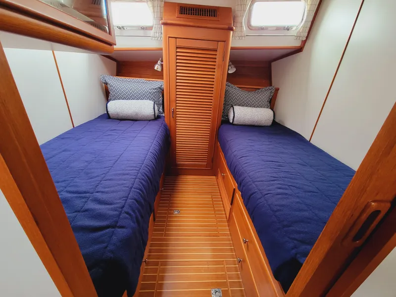 Slide: The Image of Interior of 2004 Grand Banks 49 Eastbay HX with twin beds. - 22