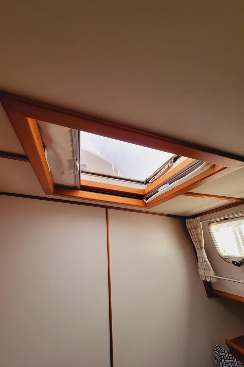 Slide: The Image of Interior of 2004 Grand Banks 49 Eastbay HX with skylight. - 25