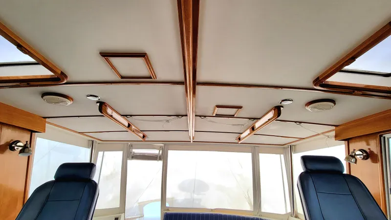 Slide: The Image of Interior of 2004 Grand Banks 49 Eastbay HX with wood accents. - 9