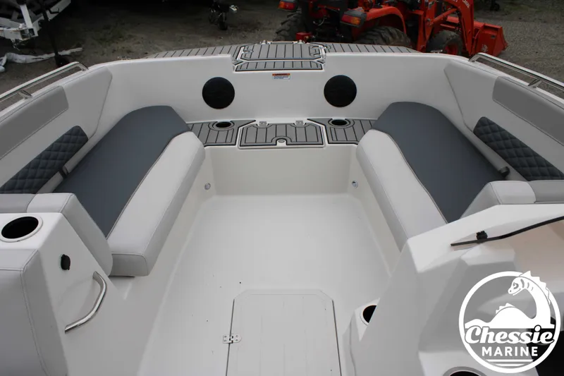 Slide: The Image of Interior of 2025 Starcraft SVX 171 OB boat with gray upholstery. - 12
