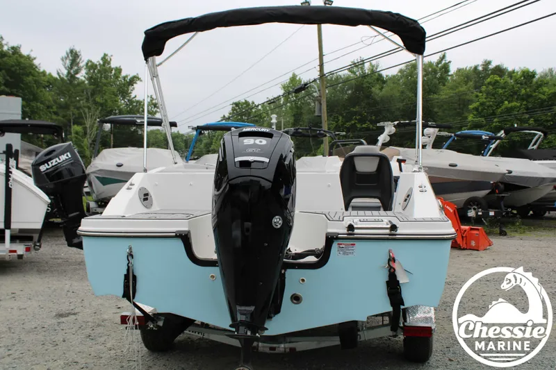 Slide: The Image of Rear view of 2025 Starcraft SVX 171 OB boat with outboard motor. - 4