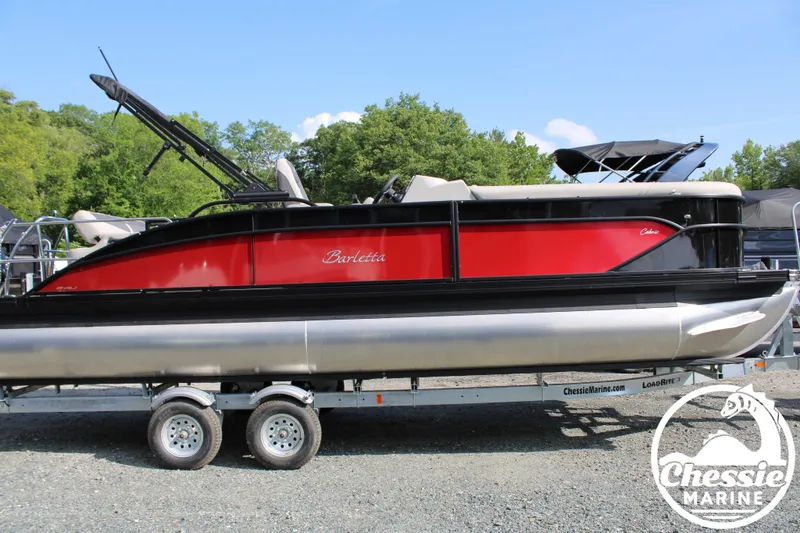 Slide: The Image of 2025 Barletta CABRIO C24U pontoon boat on trailer. - 5