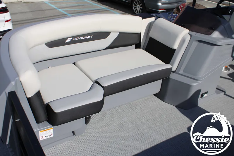 Slide: The Image of Starcraft VX 22 R DH 2026 boat seat with gray and black upholstery. - 10