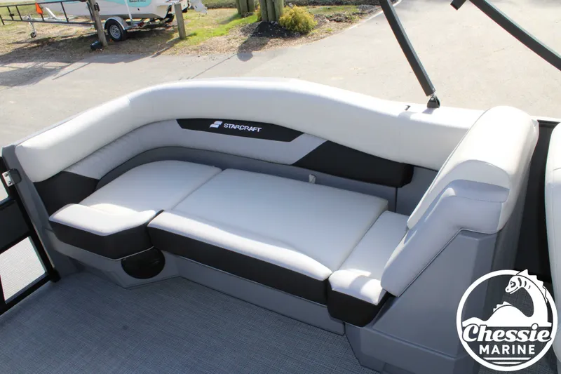 Slide: The Image of Starcraft VX 22 R DH 2026 boat seating with gray upholstery. - 17