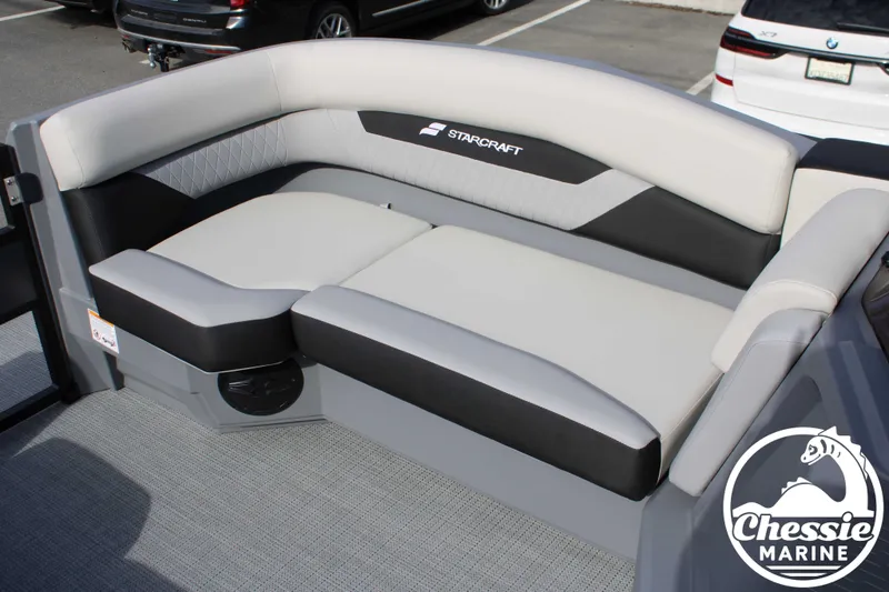 Slide: The Image of Starcraft VX 22 R DH 2026 boat seat with gray upholstery. - 22