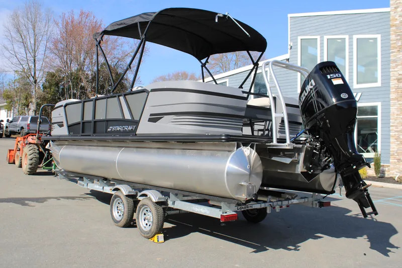 Slide: The Image of 2026 Starcraft VX 22 R DH pontoon boat on trailer. - 3