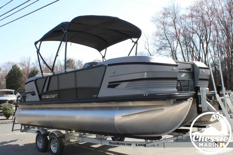 Slide: The Image of 2026 Starcraft VX 22 R DH pontoon boat on trailer. - 7
