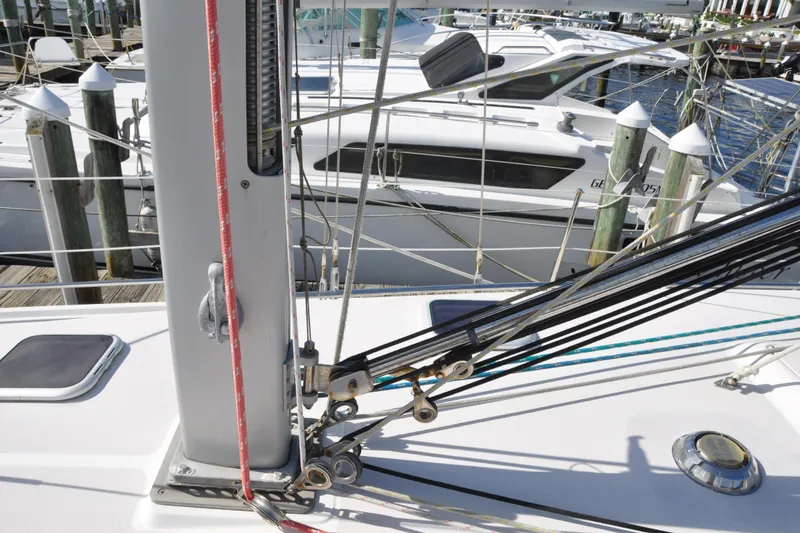 Slide: The Image of Sailboat deck of 2003 Catalina 387 with rigging and marina background. - 15