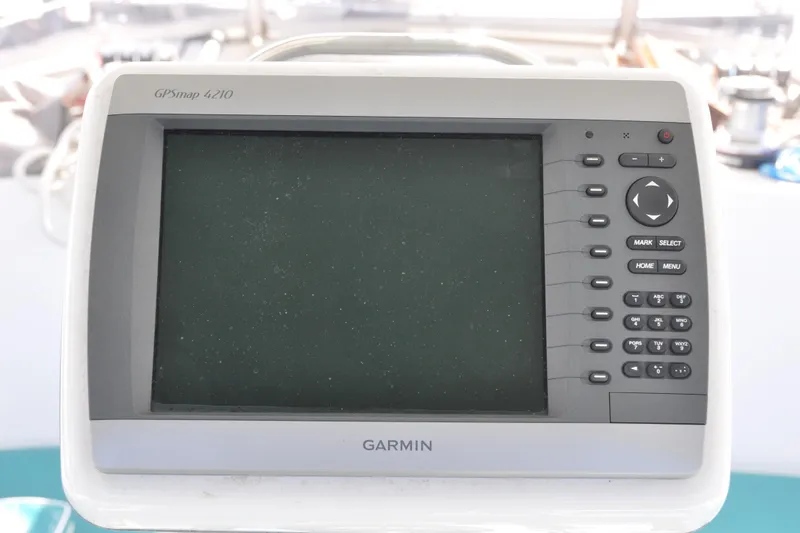 Slide: The Image of Garmin GPSmap 4210 on Catalina 387 yacht, 2003 model, with navigation controls. - 22