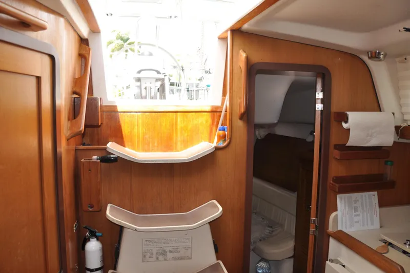 Slide: The Image of Interior of a 2003 Catalina 387 yacht with wooden finish. - 37