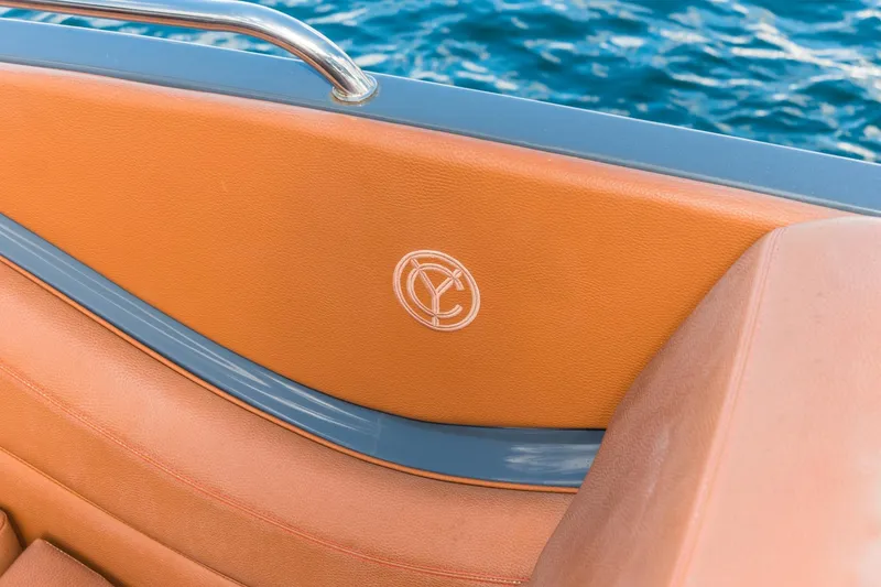 Slide: The Image of 2017 Cruisers Sport Series 298 Bow Rider South Beach Edition interior detail with water backdrop. - 16