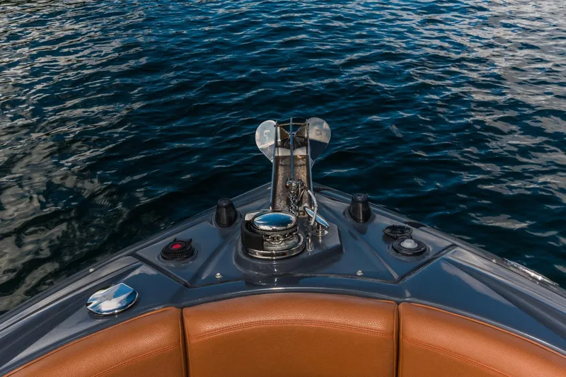 Slide: The Image of Bow of 2017 Cruisers Sport Series 298 Bow Rider on water. - 17