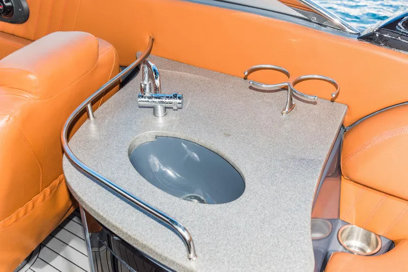 Slide: The Image of Luxury sink area on 2017 Cruisers Sport Series 298 Bow Rider South Beach Edition boat. - 18