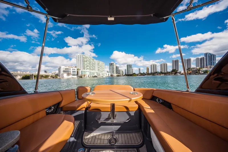 Slide: The Image of 2017 Cruisers Sport Series 298 Bow Rider with city skyline view. - 21