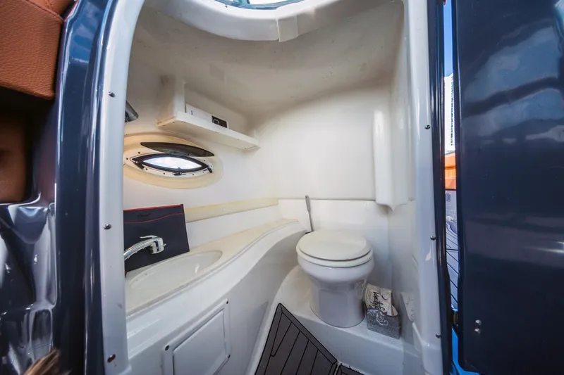 Slide: The Image of 2017 Cruisers Sport Series 298 Bow Rider South Beach Edition boat bathroom interior. - 30