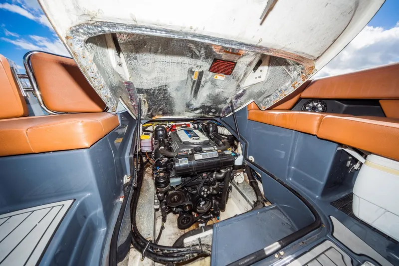 Slide: The Image of Engine compartment of 2017 Cruisers Sport Series 298 Bow Rider South Beach Edition boat. - 31
