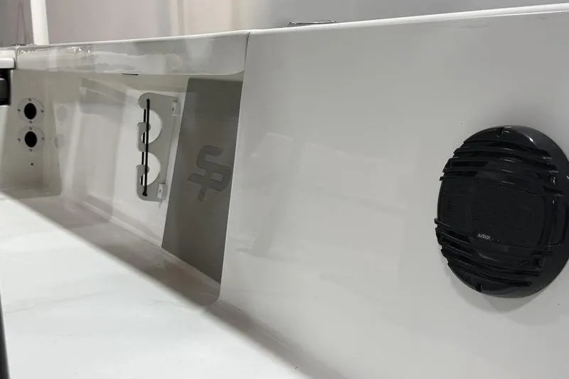 Slide: The Image of 2026 Sea Pro 230 Bay boat interior with speaker and sleek design. - 18