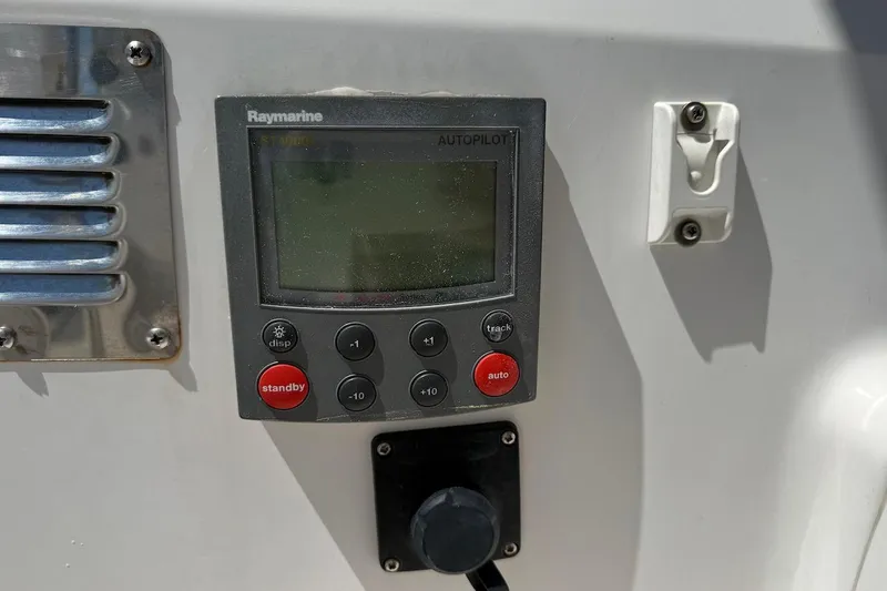Slide: The Image of Raymarine autopilot control panel on a 1998 Catalina 380 sailboat. - 18