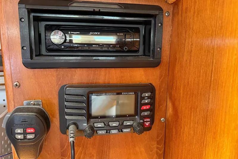 Slide: The Image of Control panel with Sony stereo and Standard Horizon radio on Catalina 380, 1998 model. - 41