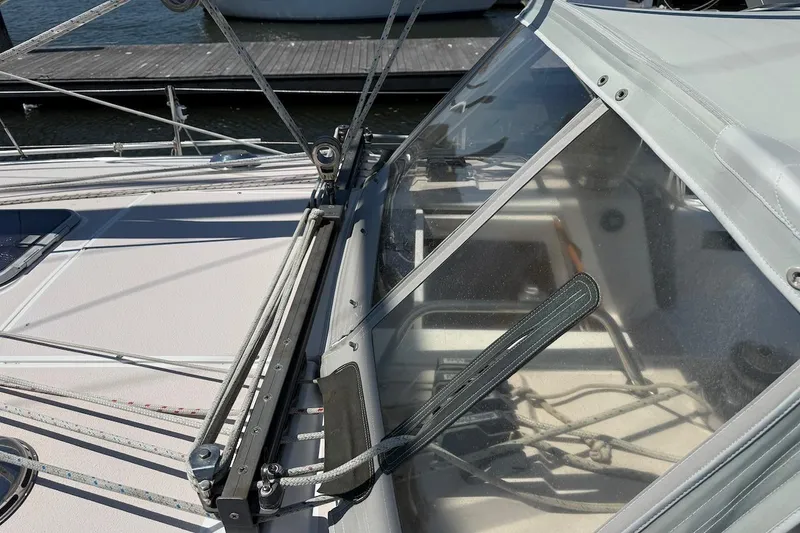 Slide: The Image of Close-up of a 1998 Catalina 380 sailboat deck and cockpit area. - 9