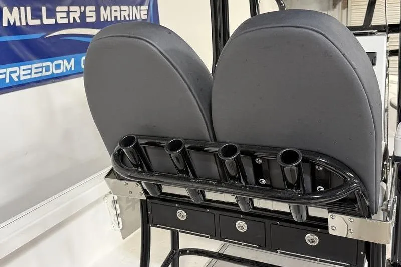 Slide: The Image of 2026 Sea Pro 230 Bay boat seats with rod holders and storage drawers. - 12